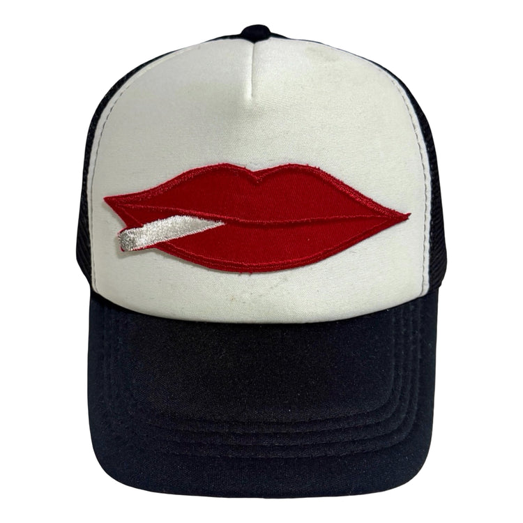 Lips and cigarette trucker hat front