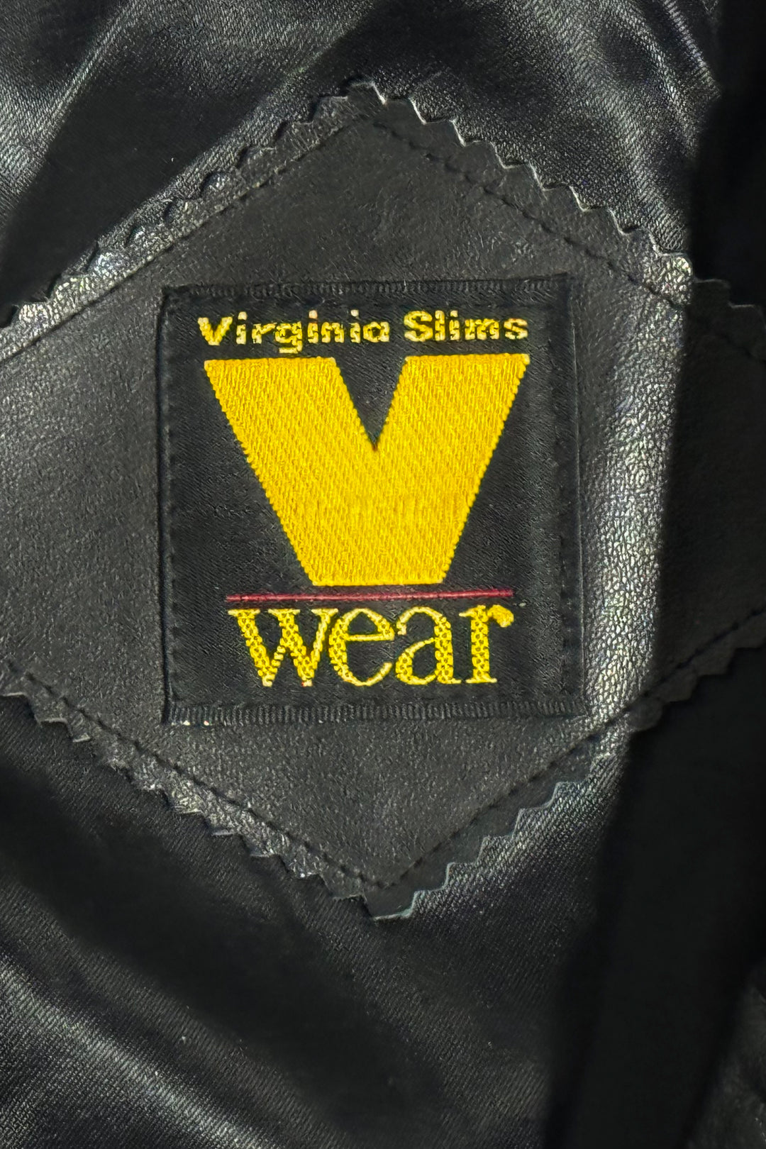 1990’S VIRGINIA SLIMS “V WEAR” CROPPED BLACK LEATHER ASYMMETRICAL MOTORCYCLE BIKER JACKET WOMEN’S LARGE / MEN’S MEDIUM