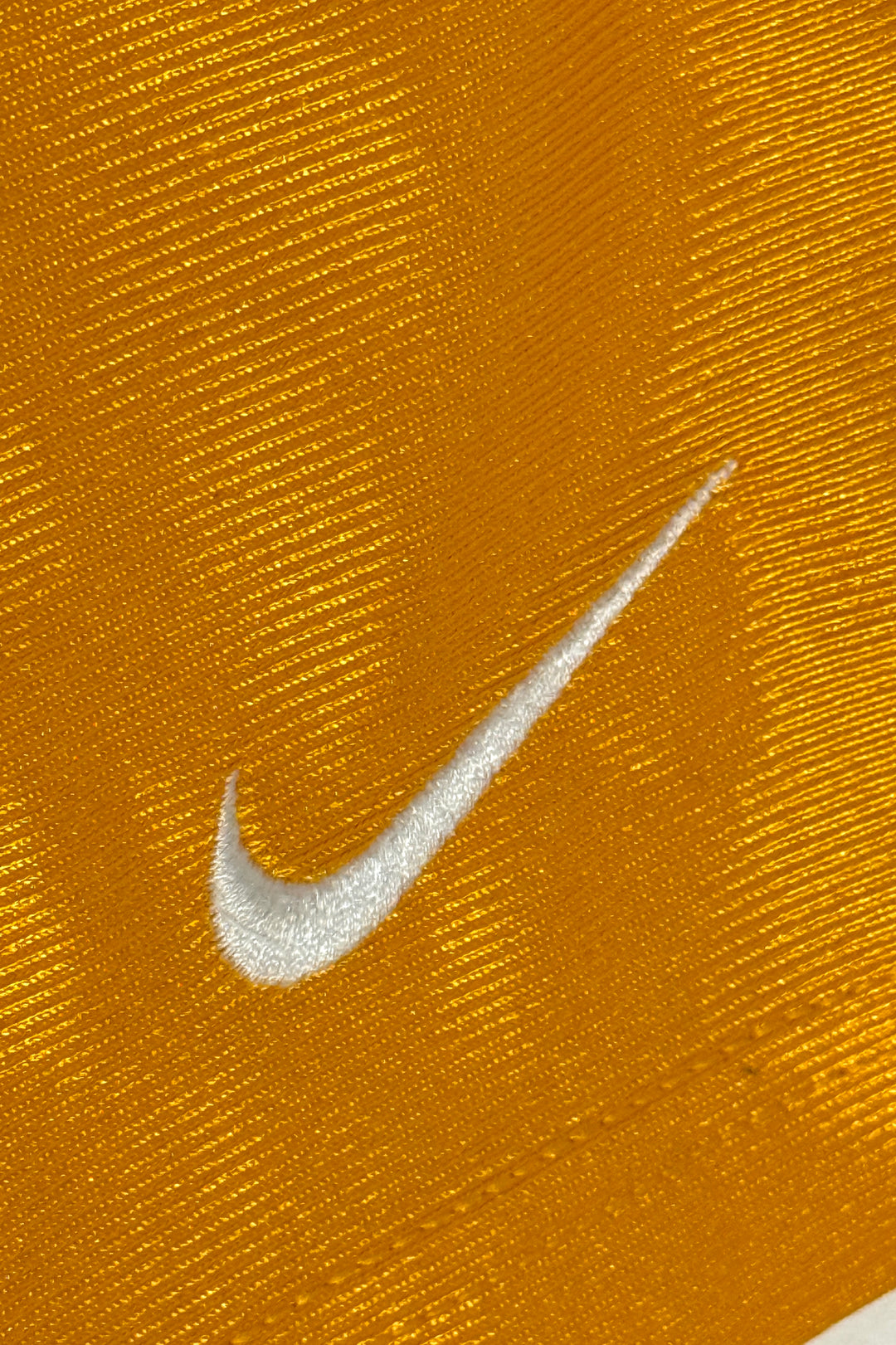 1990’S NIKE SATIN YELLOW 8” BASKETBALL SHORTS LARGE
