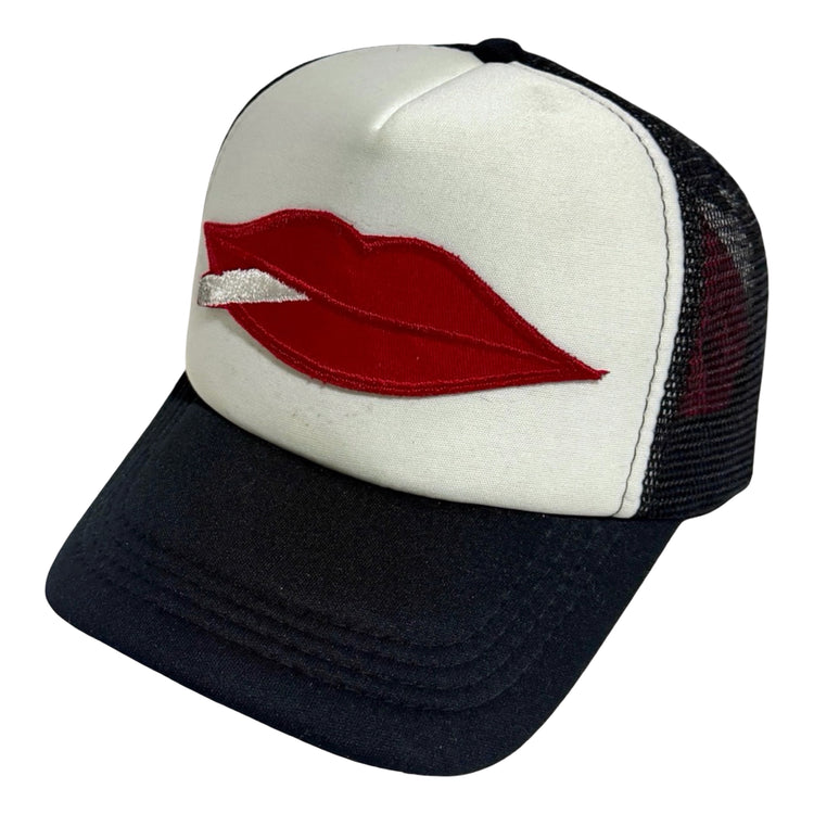 Lips and cigarette trucker hat angle