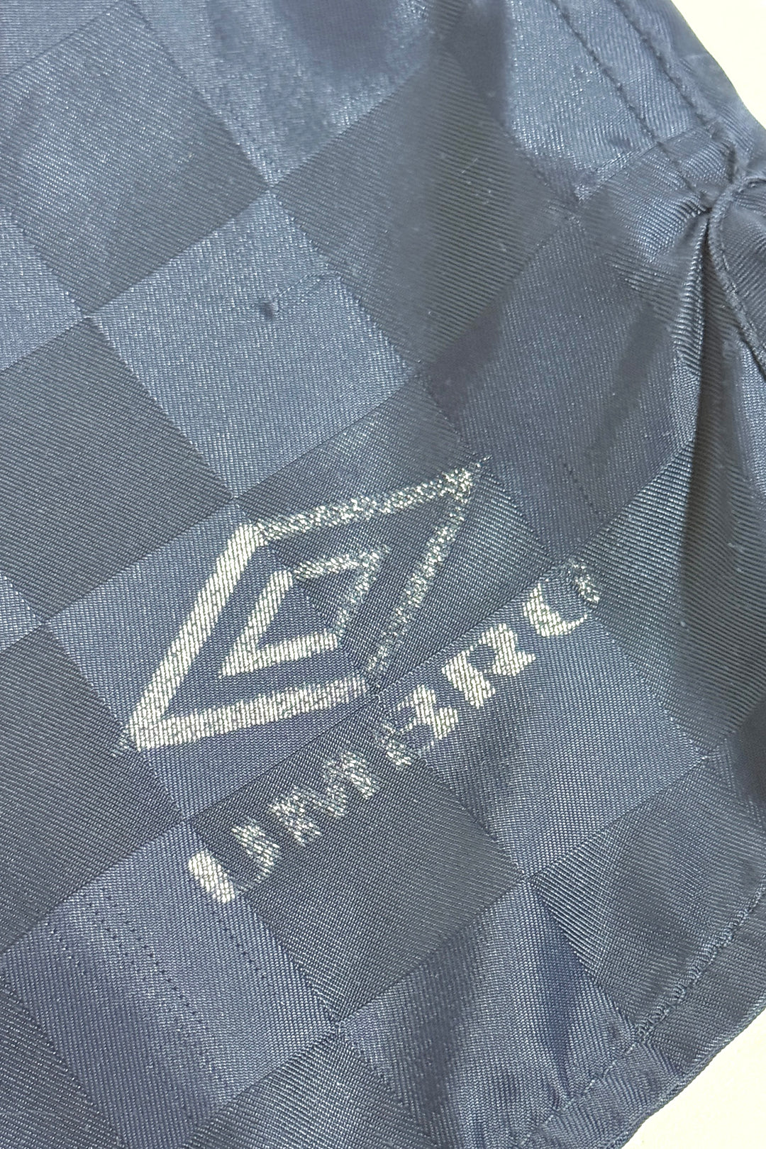 1990’S UMBRO MADE IN USA THRASHED & FADED CHECKERED 5” SOCCER SHORTS LARGE