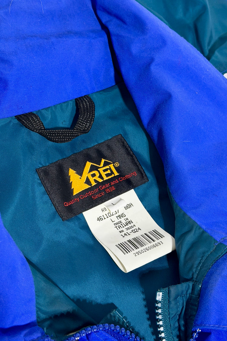 REI rain jacket brand tag