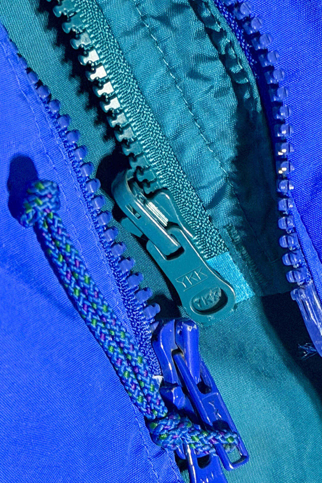 REI rain jacket zipper detail