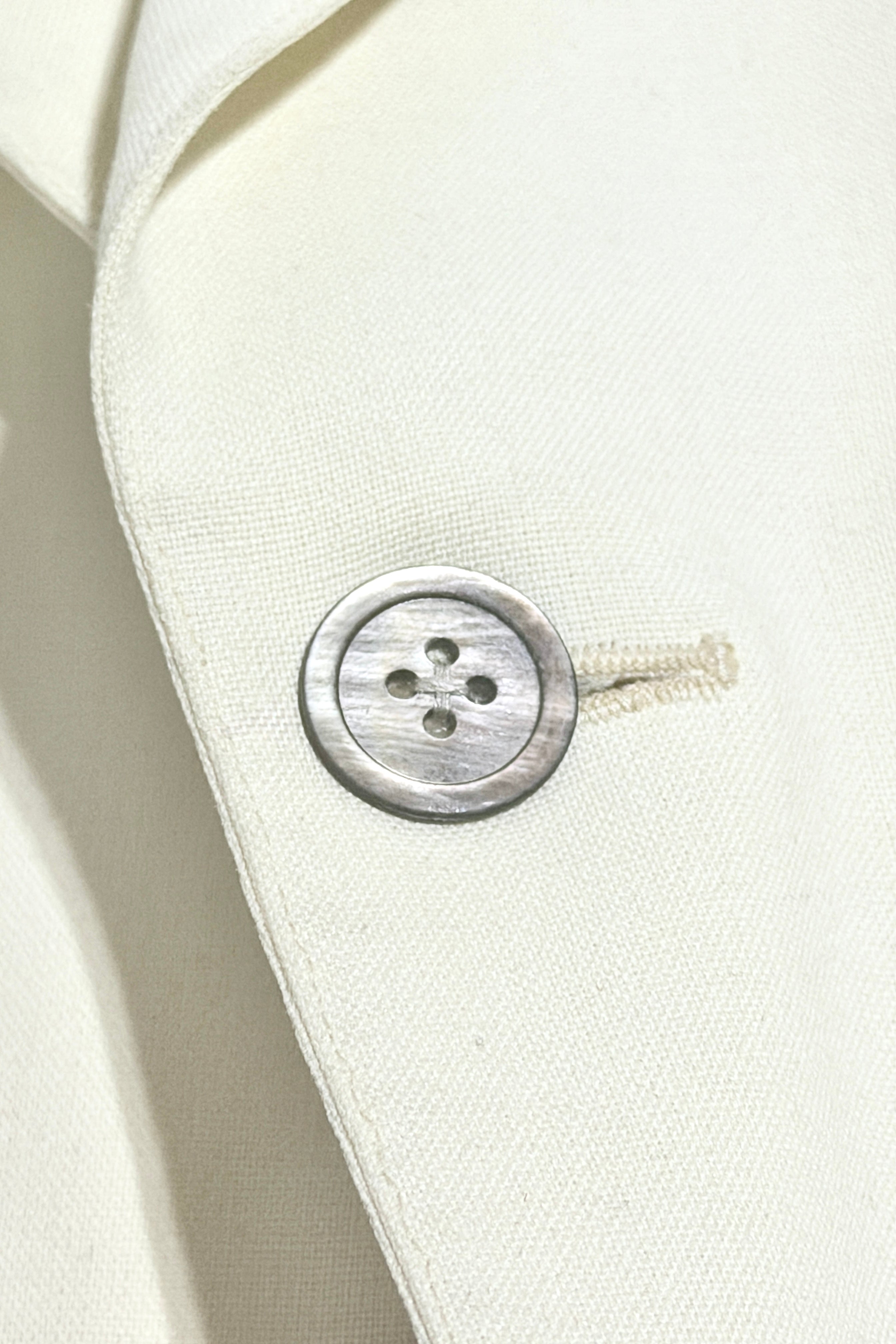 Shawl collar button detail