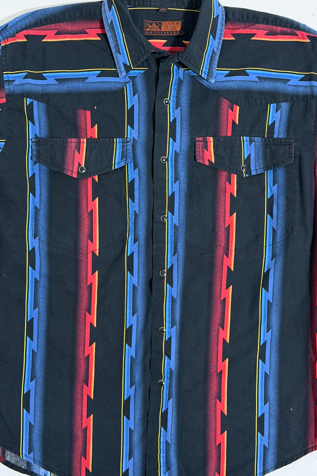 Canyon Guide Outfitters lightning bolt detail