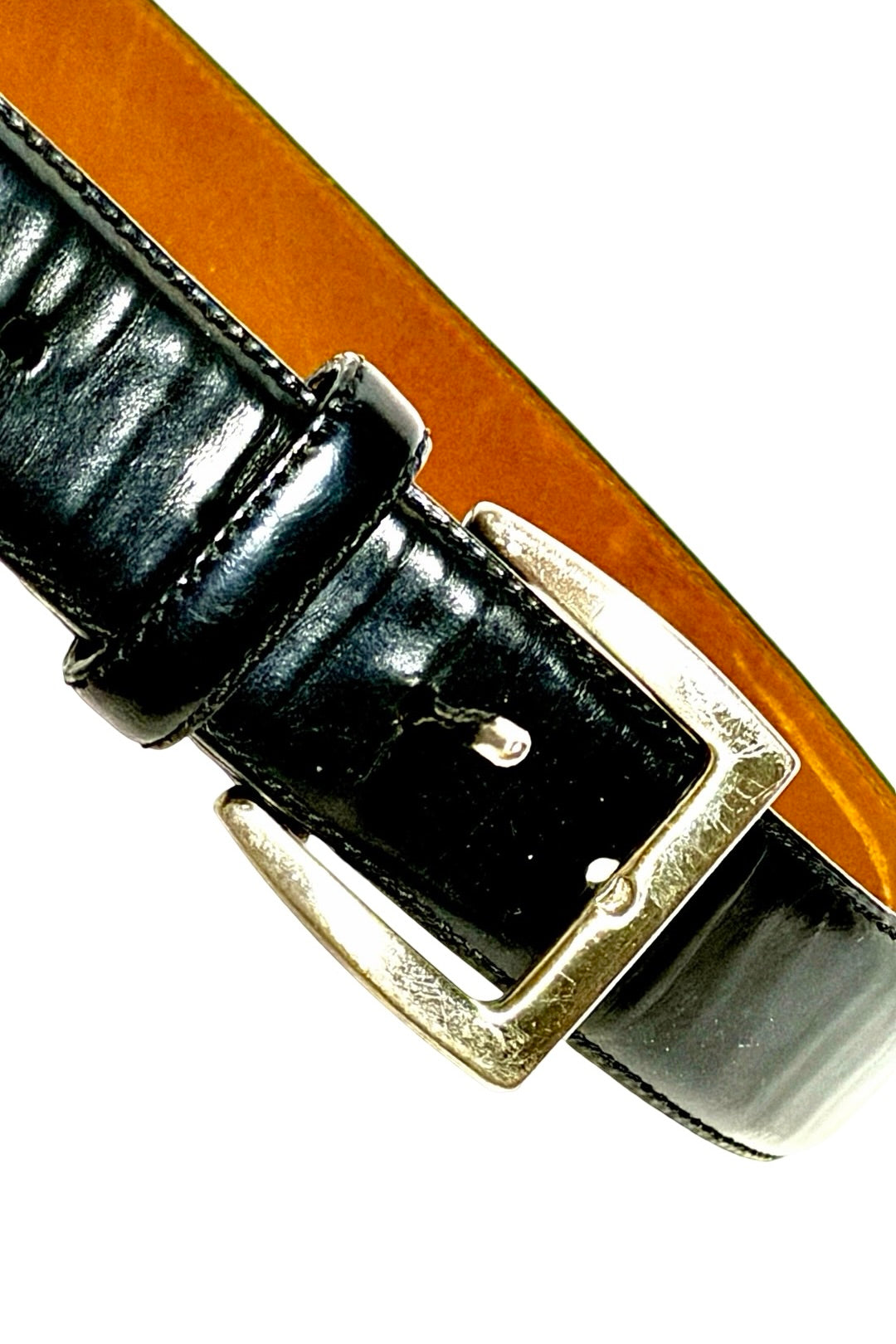 Coach belt buckle closeup