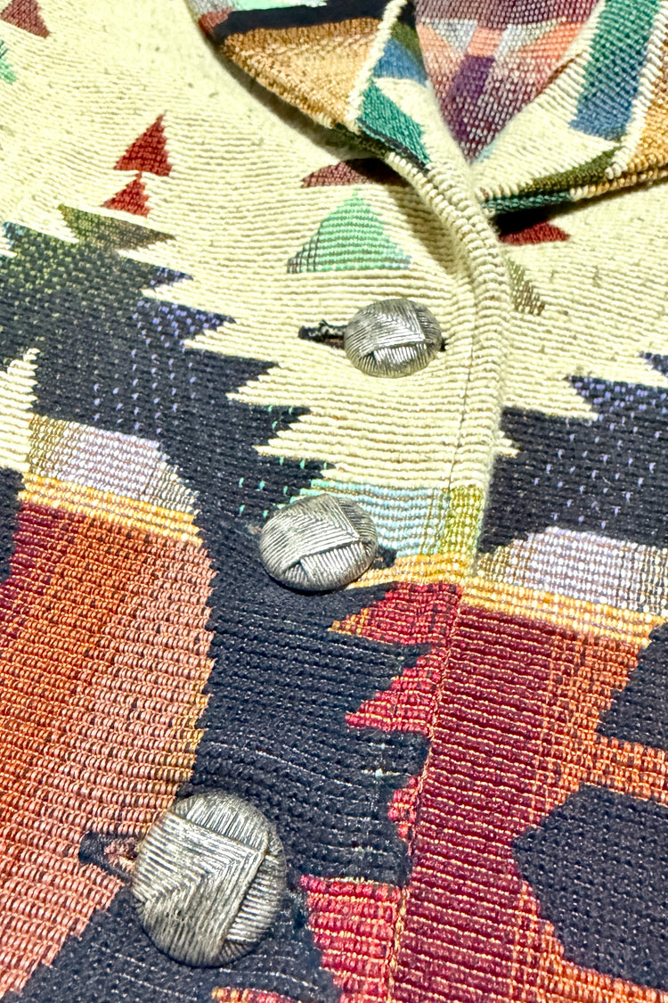 Textured silver tone button detail
