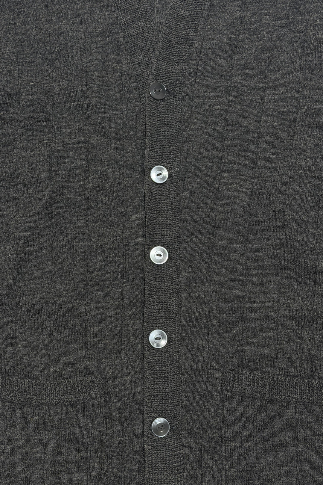Mother-of-pearl button placket detail