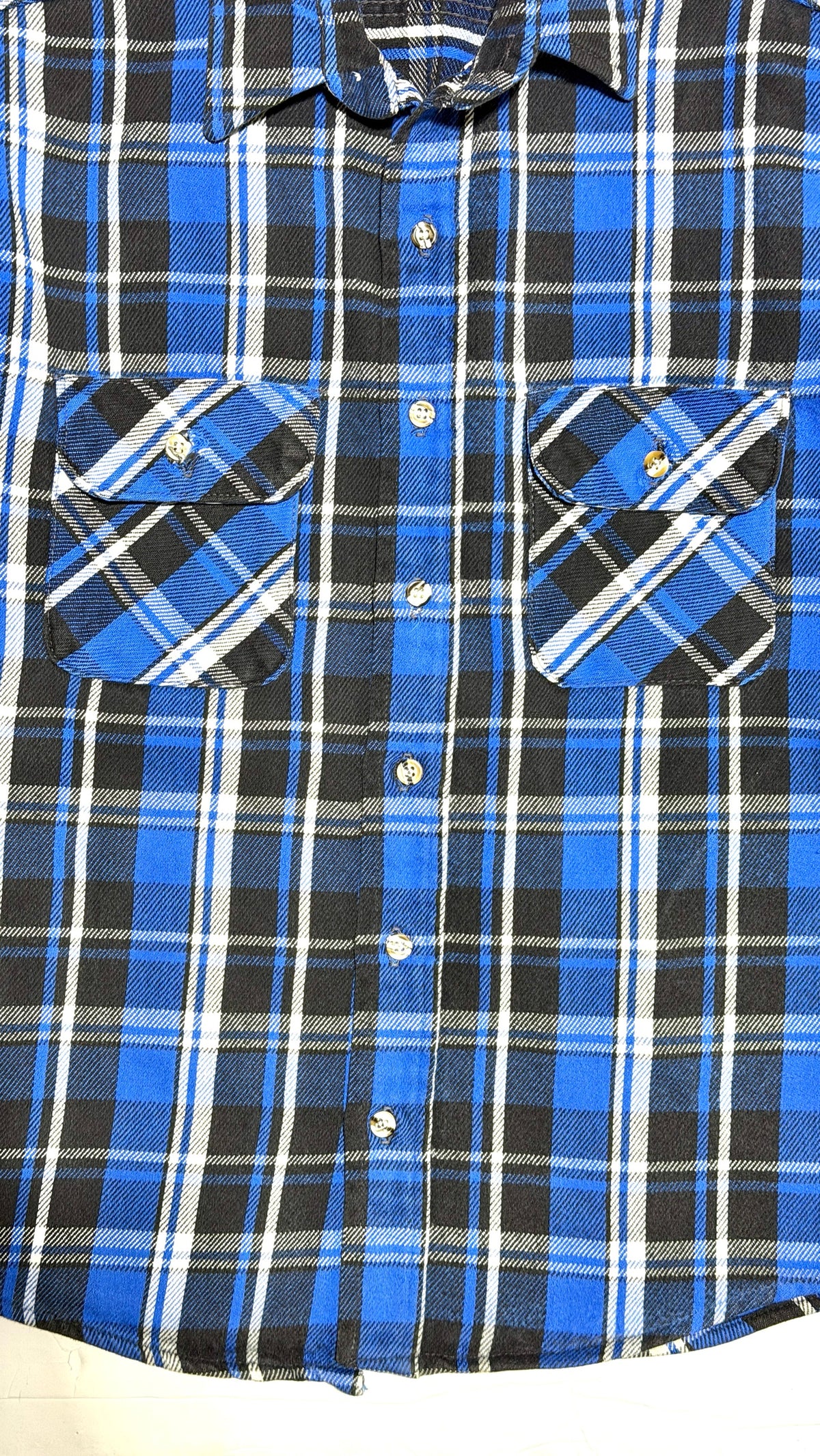 Five Brother flannel shirt, front button placket and flap chest pockets closeup