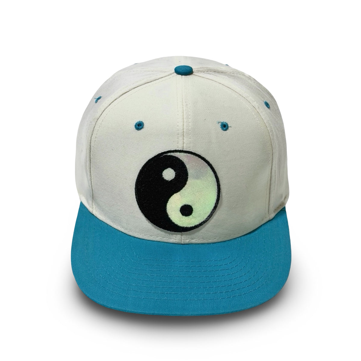 Yin yang patch white and teal snapback hat front