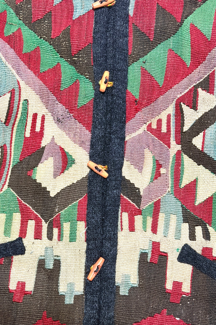 Kilim panel and wooden toggle detail