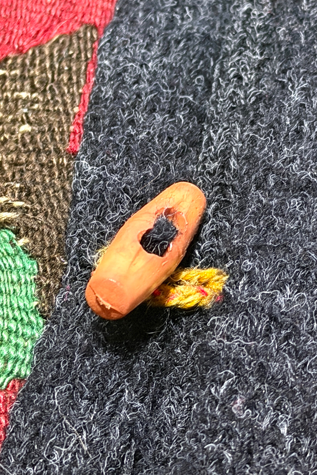 Wooden toggle closure close up