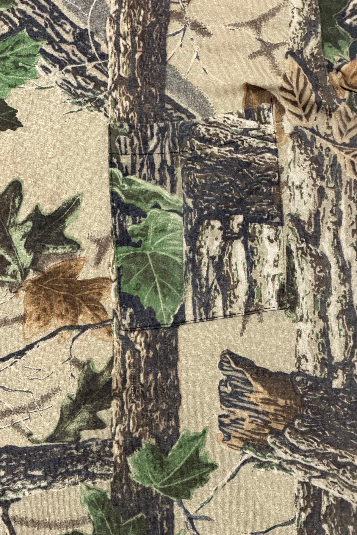 Realtree camo chest pocket detail