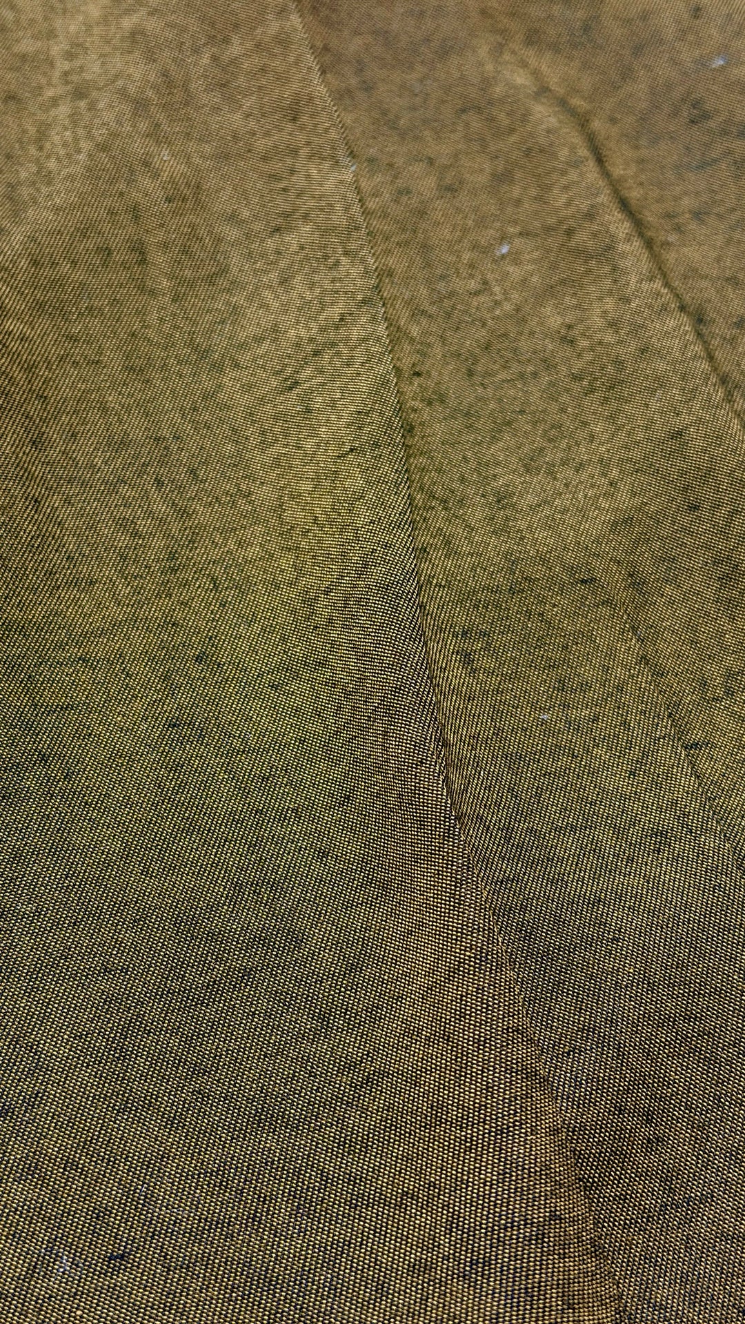 Black and gold sharkskin weave detail