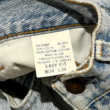 Load image into Gallery viewer, 1990’S GAP MADE IN USA EASY FIT HIPPY BELL BOTTOM LIGHT WASH DENIM JEANS 32 X 36
